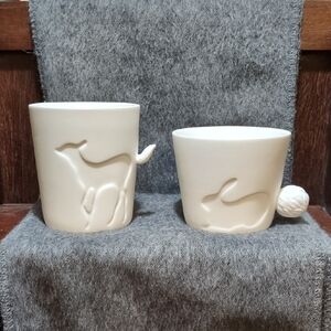 Elegant Cream Animal Motif Vases